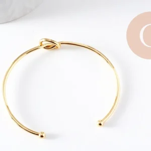 Bracelet jonc ouvert noeud 3mm laiton doré 53x62mm, x1 (G10312)